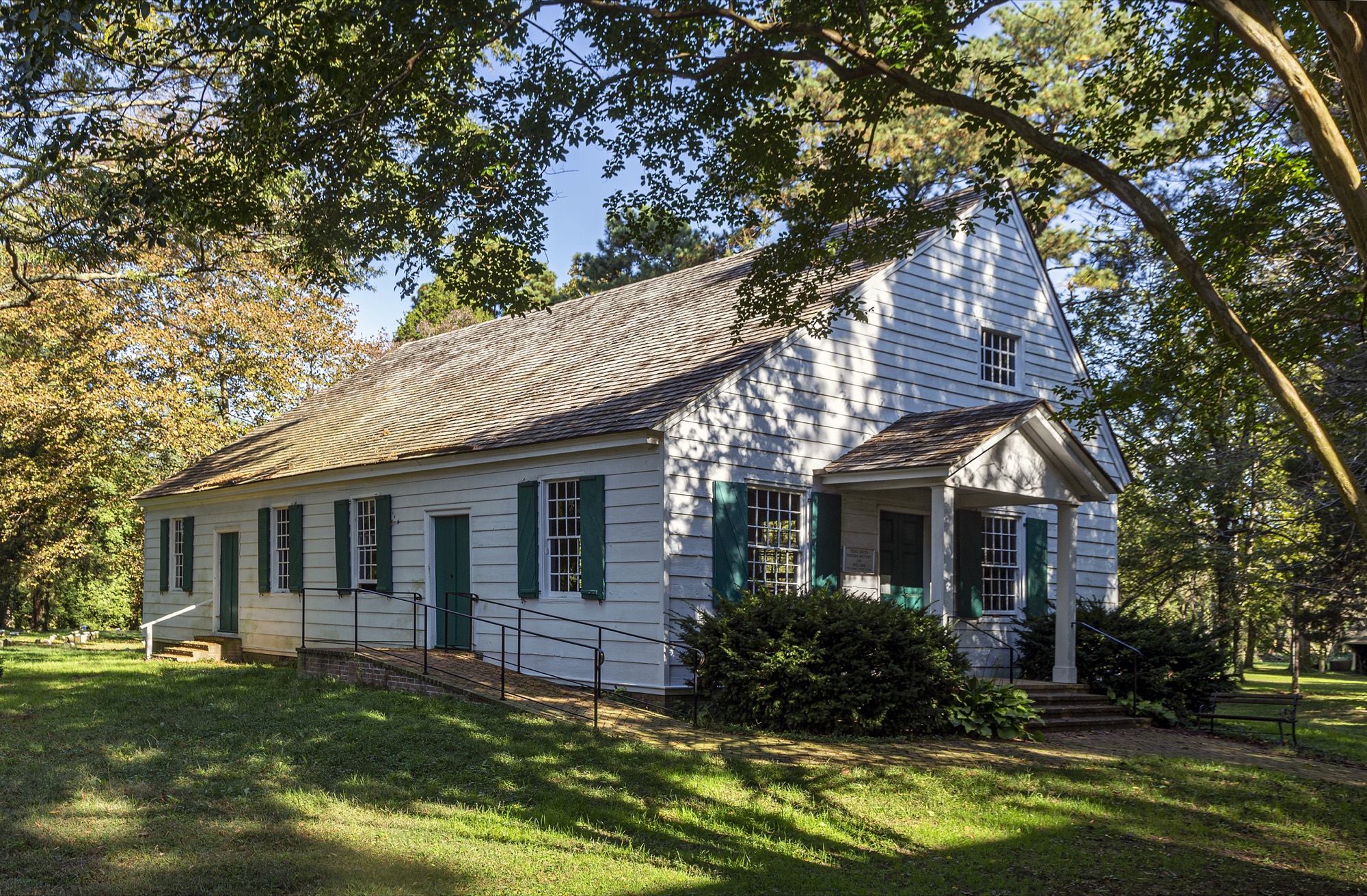 The Third Haven Meeting House in Easton, Maryland, built in 1684, under old trees