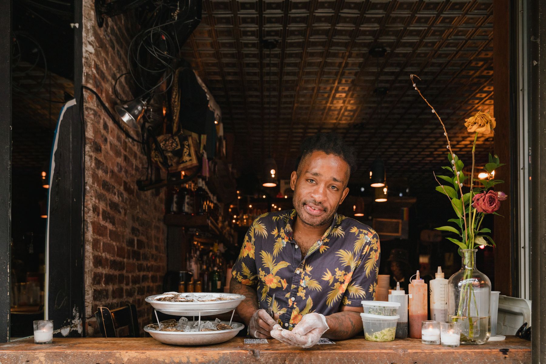 A local owner behind the bar on event night in Easton, Maryland, the kind of night people buy tickets for.
